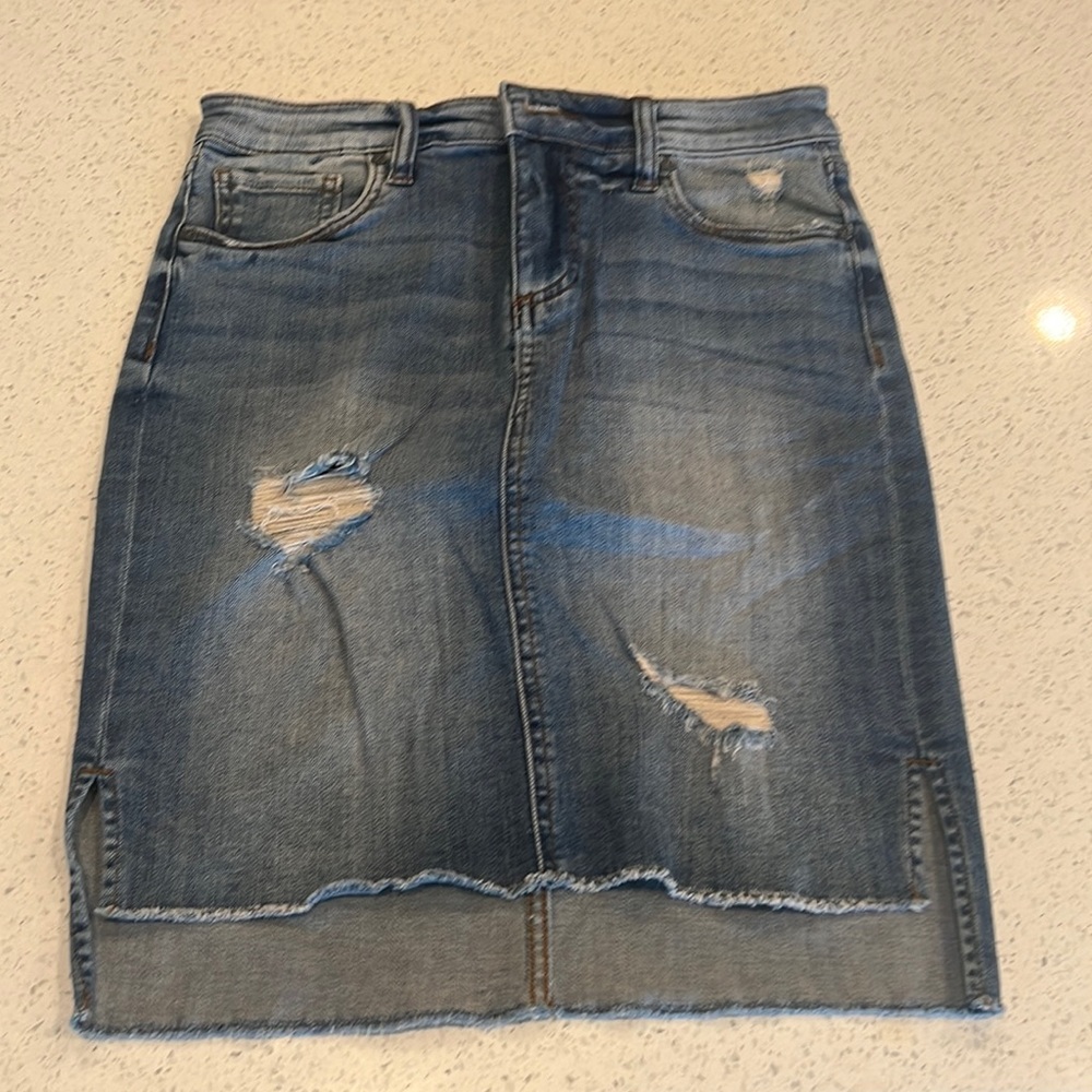 Kut from the Kloth denim distressed raw hem Connie skirt.